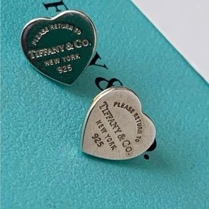 Tiffany & Co. Mini heart sterling silver stub earrings.